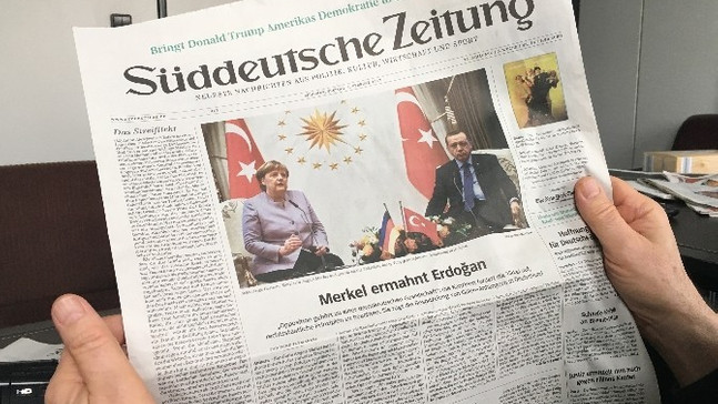 Merkel’in  ziyareti manşetlerde
