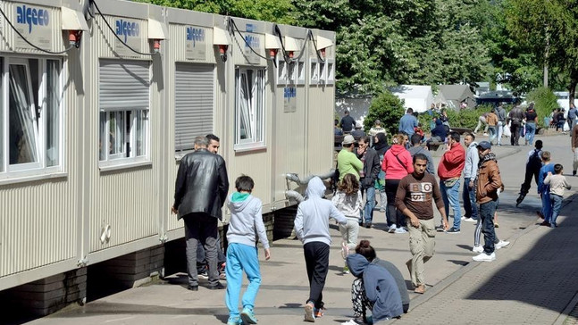 Almanya’da, mülteciler apartman dairelerinde yaşamaya başladı
