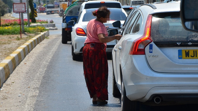 Sürücülerin dilenci tepkisi